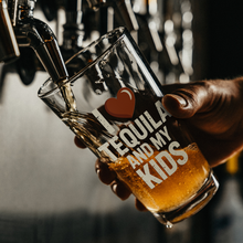 Load image into Gallery viewer, I_Love_Tequila__My_Kids_Pint_Glass_Dark_Lifestyle_Mockup.png
