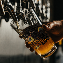 Load image into Gallery viewer, In_the_Beginning_God_Created_Tequila__K_Pint_Glass_Dark_Lifestyle_Mockup.png
